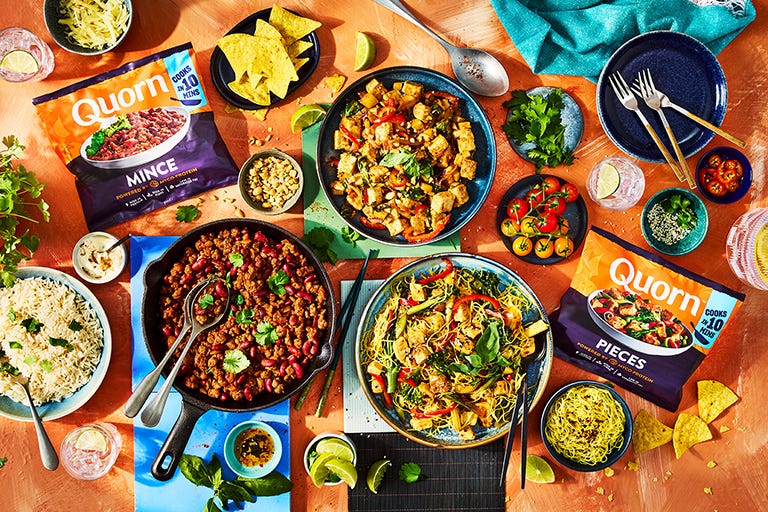 Quorn products and three bowls of prepped meals, made in minutes featuring Quorn mince and Quorn Pieces.